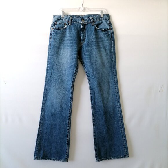 Uniqlo Mens Denim Blue Mid Rise Five Pocket Design Bootcut Jeans Size 34 - Picture 1 of 7